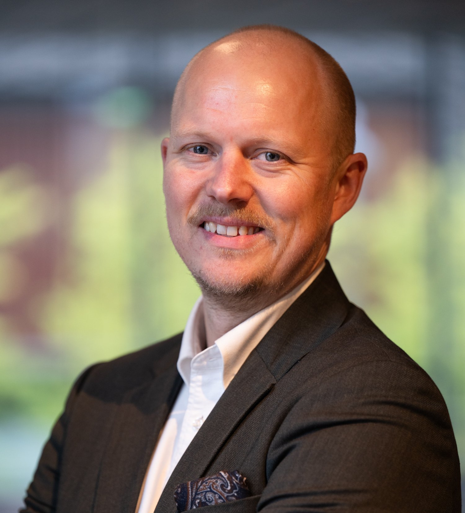 Porträtbbild på Rune Dall Jensen.