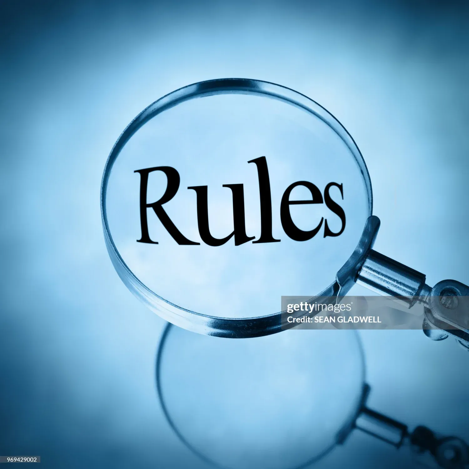 förstoringsglas med texten rules