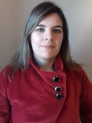 Photo of woman with red shirt.